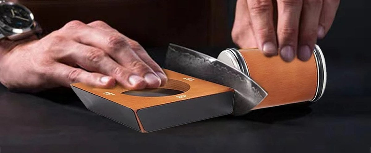 Sharpening a knife with the roller sharpener and its base